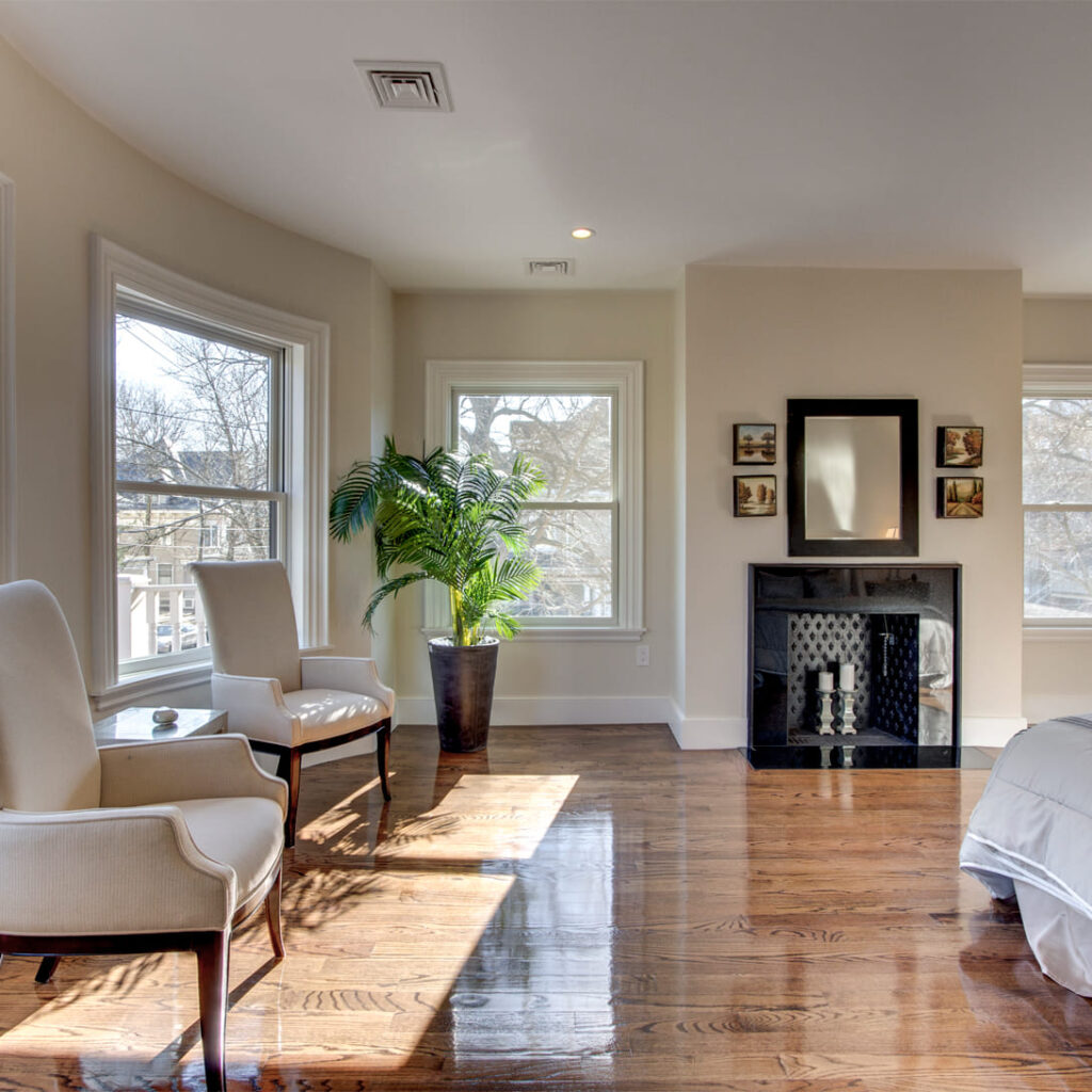 50 Naples Road primary bedroom with fireplace
