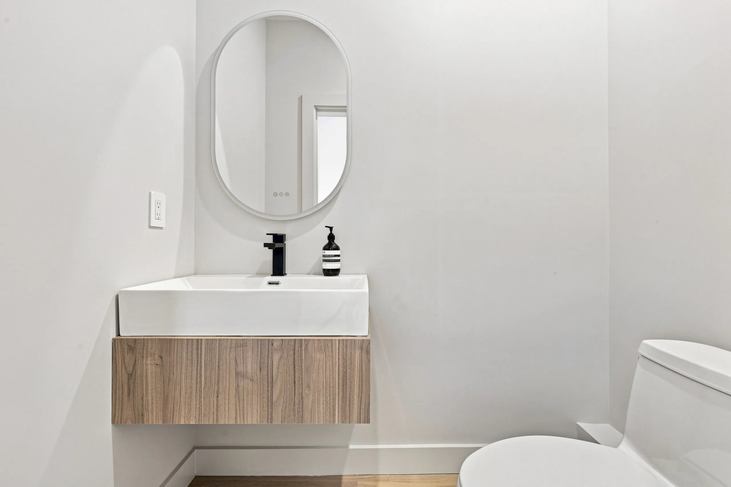 Half bath with floating walnut vanity